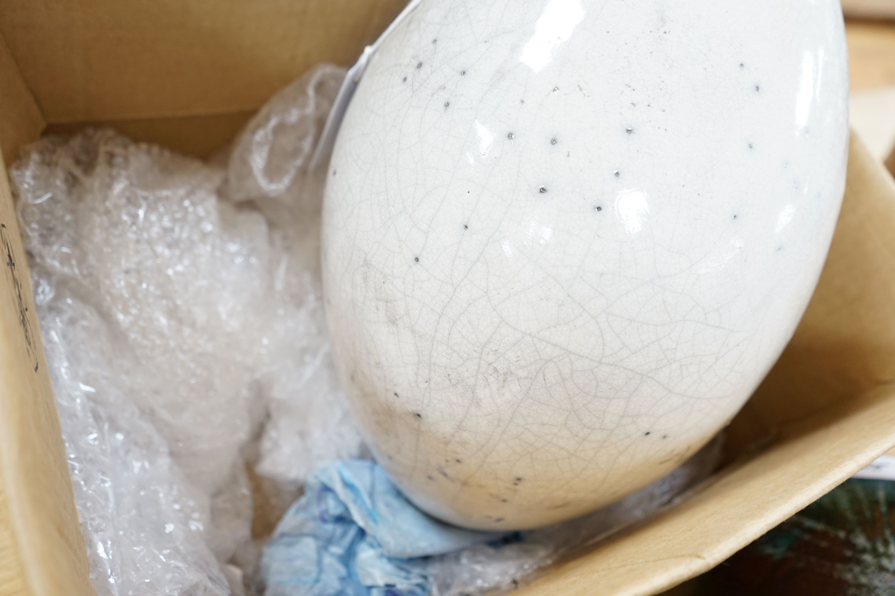 Studio pottery- an Allison Weightman raku fired large albastron form vase, ovoid vase and cup and a Petra Reynolds oval stoneware pot (4) Tallest 44cm
